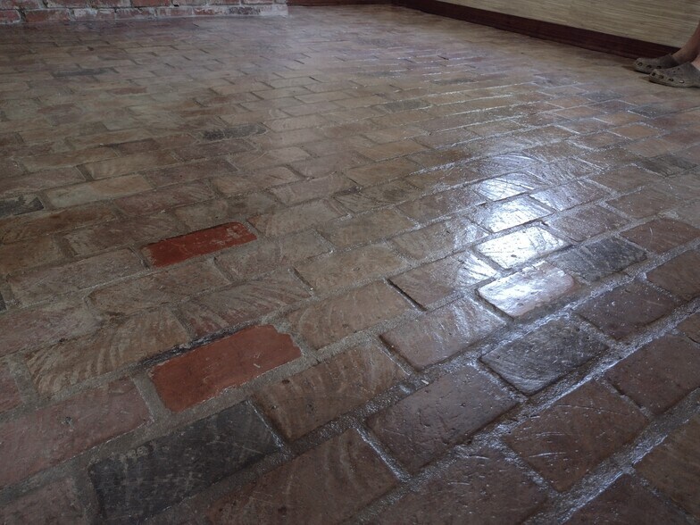 Sealed brick floor in den - 310 Old Covington Hwy