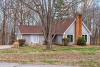 Building Photo - Lovely home on beautiful wooded corner lot