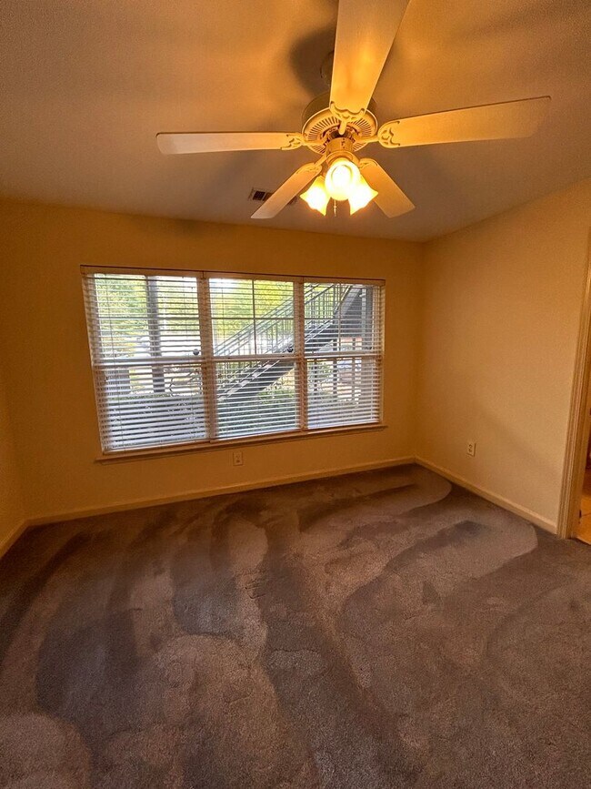 Building Photo - Two Bedrooms Available in this Three Bedroom Flat, Female Applicants!