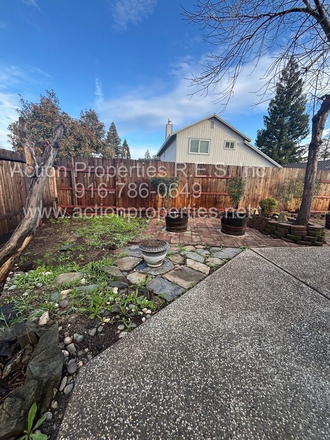 Building Photo - Action Properties RES Inc: offering Single Story, New Paint, Great Room with formal dining area, ...