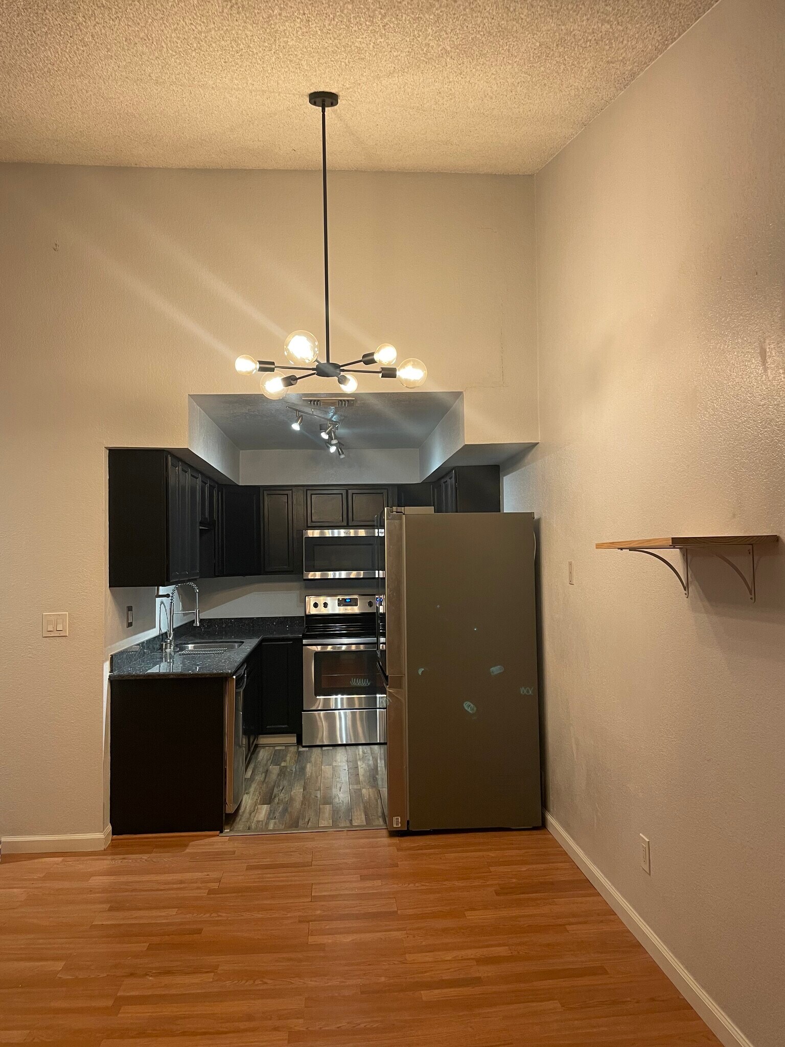 kitchen with new fridge - 250 Del Verde Cir