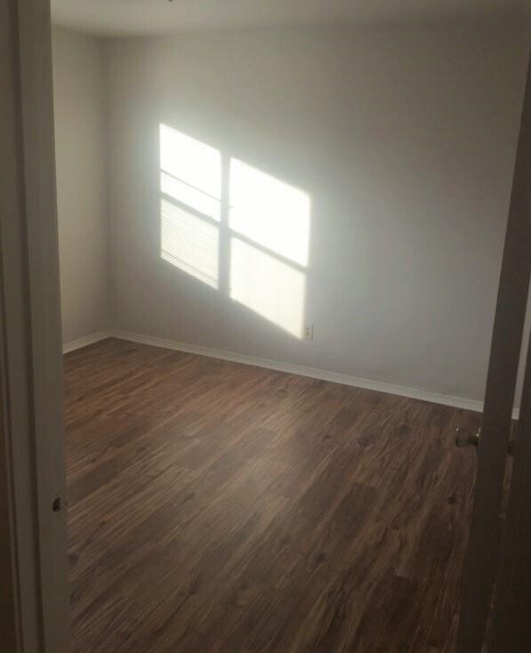 Our most common floor of Luxury Vinyl Plank in Golden Acacia. - 428 Kays Ln