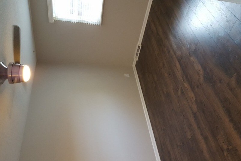 Wood and Ceramic Tile Floors - 6561 Woodhall Dr