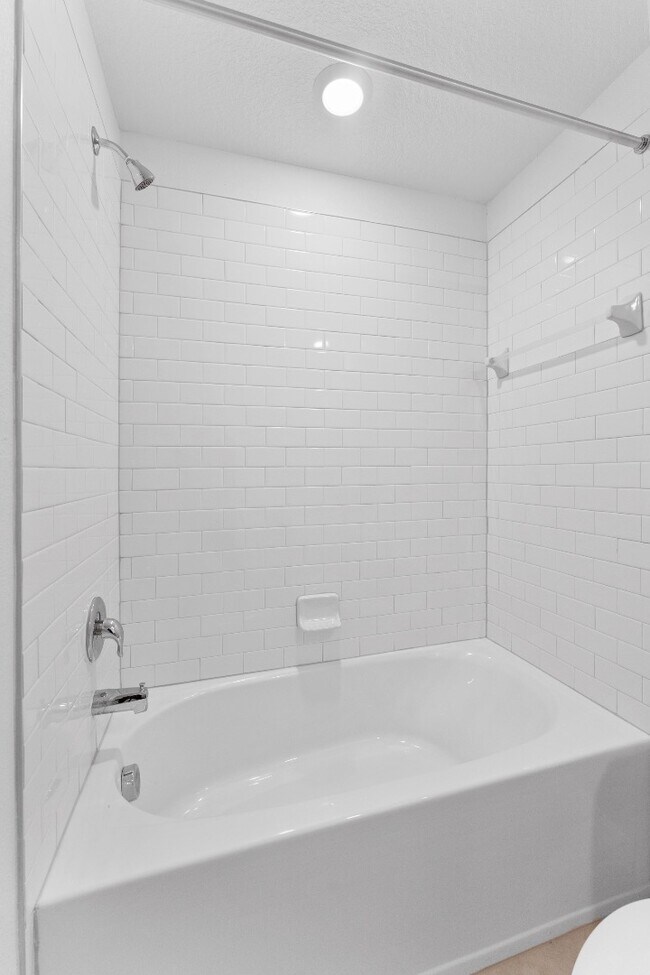 Building Photo - Absolutely stunning 3 BR /2.5 Bath / 2 Car Garage + LOFT townhome in ultra-modern and green-focus...