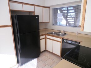 Building Photo - Downstairs - 3 Bedrooms and 2 baths with a...
