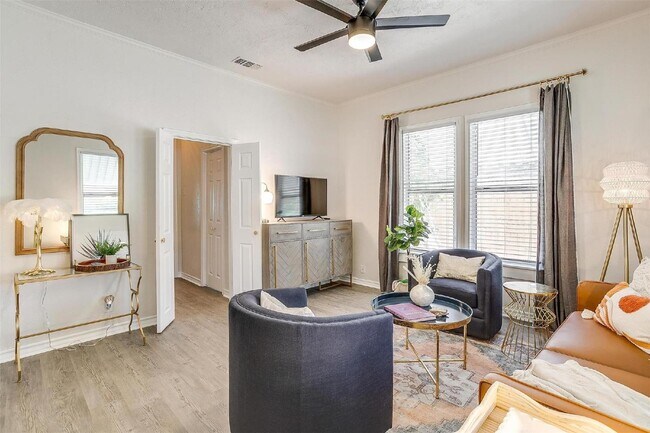 Building Photo - Charming 2-Bed, 2-Bath Gem with Granite Co...