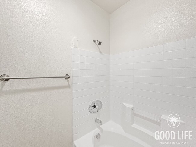 Building Photo - Elegant 3BR Residence in Exclusive Gated Community w/ AC & Garage!