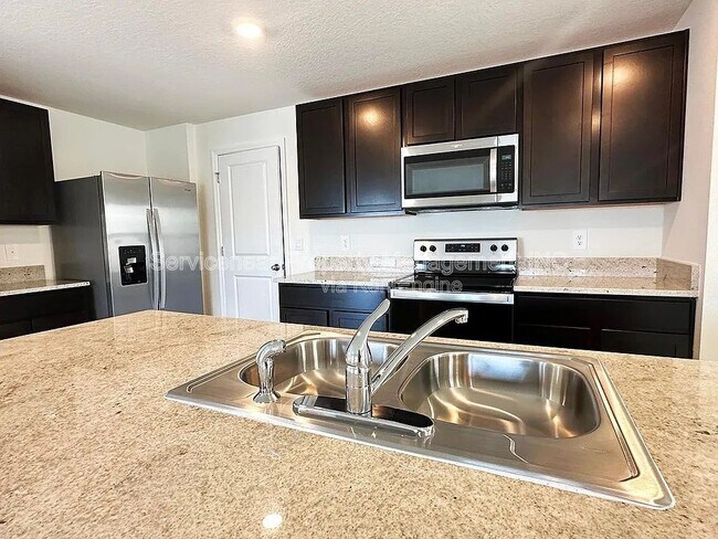 Building Photo - 5795 Cape Primrose Dr