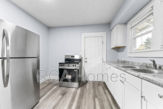 Building Photo - 1411 N Belleview Pl