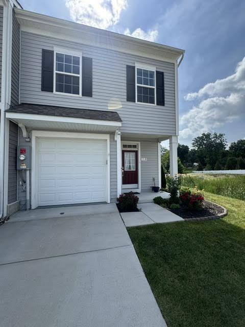 Building Photo - Modern End-Unit Townhome – Solar Powered, Garage, Pet Friendly, and HOA Amenities Included