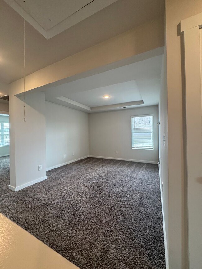 Building Photo - Spacious 3-Bedroom Home with Loft – Minute...