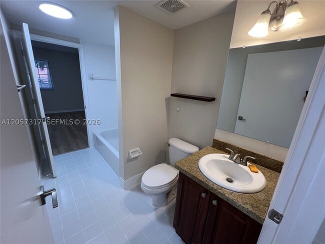 Building Photo - 202 Sable Palm Way