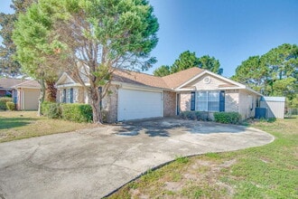 Building Photo - Lakefront Living in Gulf Breeze – Spacious...