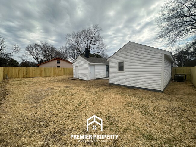 Building Photo - Quiet 3BR/2BA Cove Near Southwind | Soaring Ceilings & Floor-to-Ceiling Stone Fireplace
