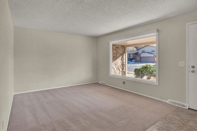 Building Photo - 8563 E Saratoga Pl
