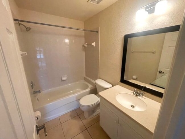 Building Photo - Stunning townhome in gated community near ...