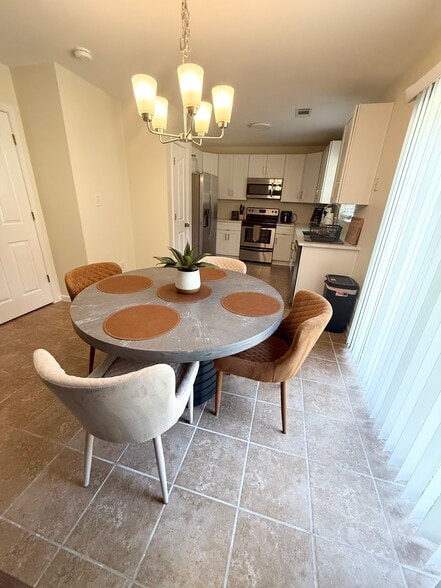 Eat in kitchen (visual with furniture) - 8253 Belmont Stables Dr