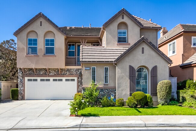 Excellent curb appeal! Safely Gated! - 18551 Amalia Ln