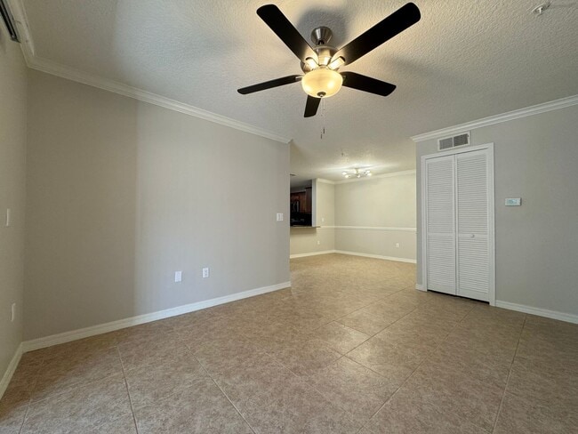 Building Photo - Oviedo 2/2 Condo with Tile & LVP Flooring, Updated Baths, New Paint & Appliances!