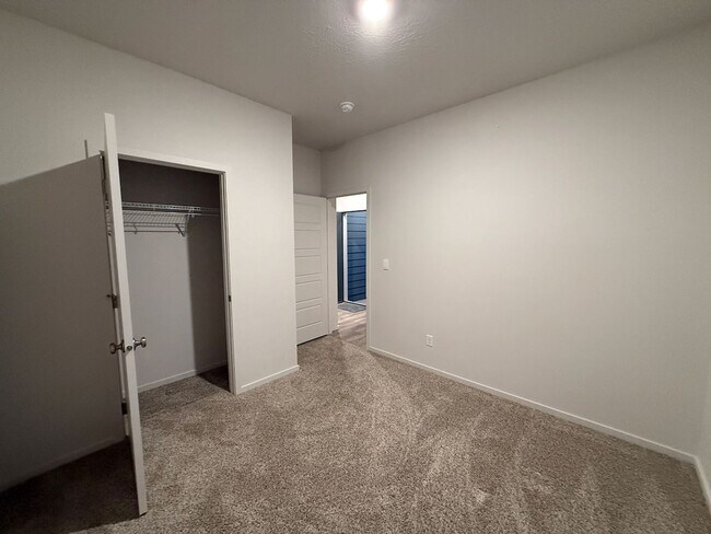 Building Photo - New Construction 4 Bed Mead School District Rancher w/ Fully-Fenced Yard and Attached Garage!