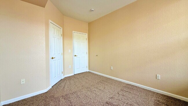 Building Photo - NEW CARPET NEW PAINT!! Clean and Bright 2BR 2BTH Condo Close To DIA. Gated Community in First Cre...