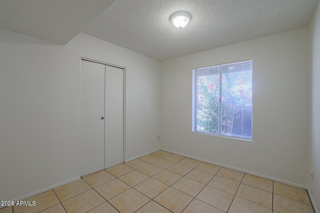 Building Photo - 3020 N 87th Ave