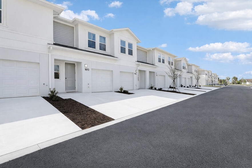 Townhomes with Garage Entry View - Encanto Isla - Encanto Isla | Townhomes for Rent