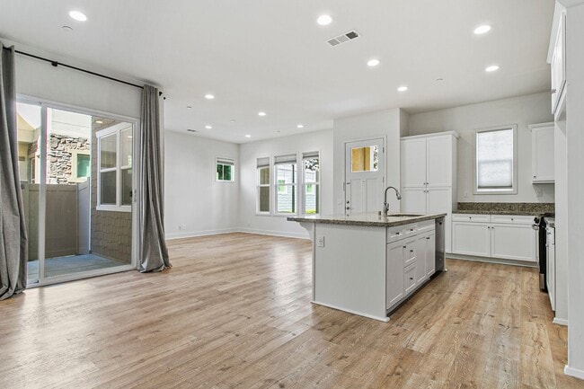 Building Photo - Stunning 4-Bedroom Home in Gated Tribella Community!