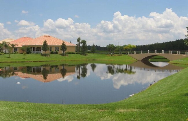 Building Photo - Gorgeous 3/2 Mediterranean Villa with Waterfront Screened Patio and 2-Car Garage in the Prestigio...