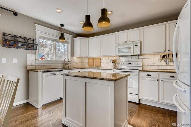 Building Photo - Evolve Real Estate: Upgraded and Stylish Remodel with Solar Panels in Highlands Ranch. Available ...