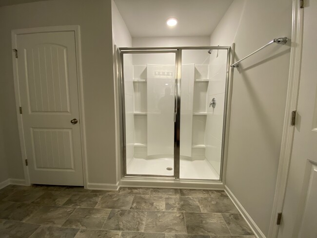 master bath view of walk-in showers and extra closet - 9010 Fenton Rd.