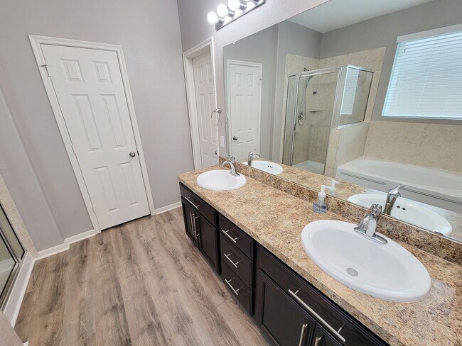 Building Photo - Welcome to this charming one-story home fe...
