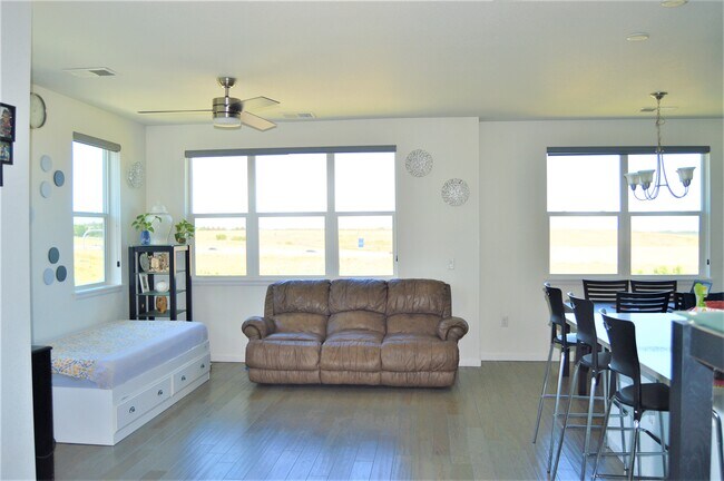 Living room window view to open area and 470 - 4771 Copeland Cir
