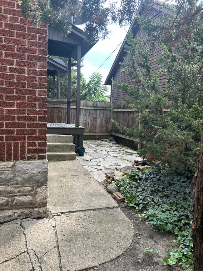 Rear porch, stone patio - 615 S 6th St