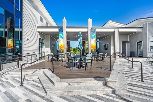 Building Photo - Luxurious Solar Powered 4 Bedroom, 3 Bath Waterfront Home with office & Upgrades Galore!