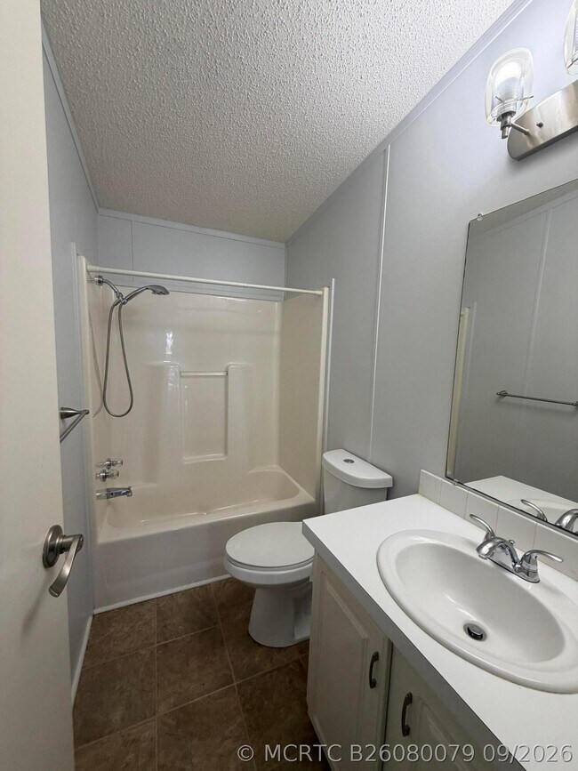 Building Photo - 8179 Sandwedge Terrace