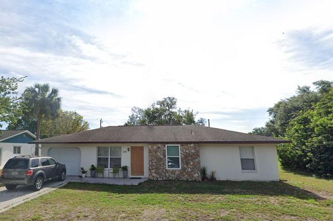 Primary Photo - Charming 3BR/2BA Home with Screened Lanai ...