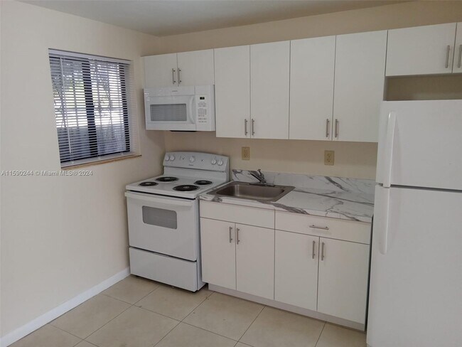 Building Photo - 1720 NW 59th St