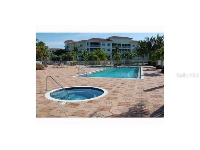 Building Photo - FOUNTAIN COURT CONDOMINIUM AVAILABLE FOR 2026 SEASON-HEART OF PUNTA GORDA