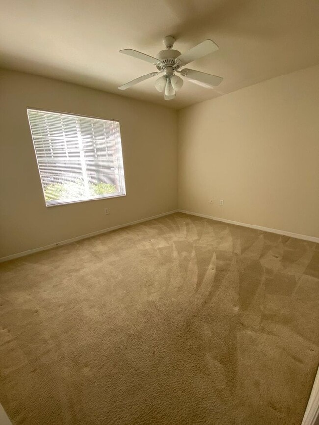 Building Photo - Spacious 2BR/2BA First-Floor Condo with Garage