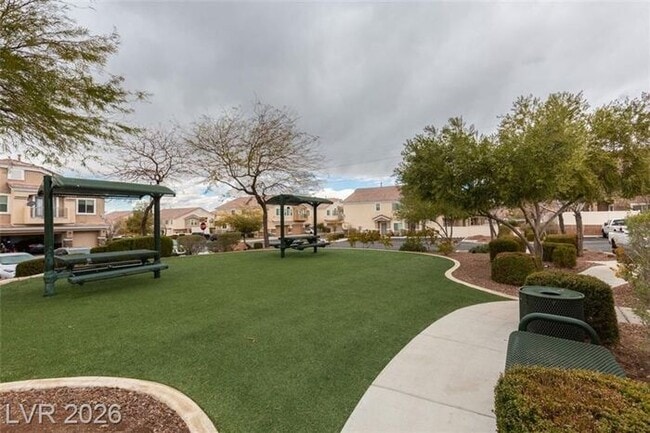 Building Photo - Cozy Gated Townhome with Private Yard, 2-Car Garage & Community Pool!