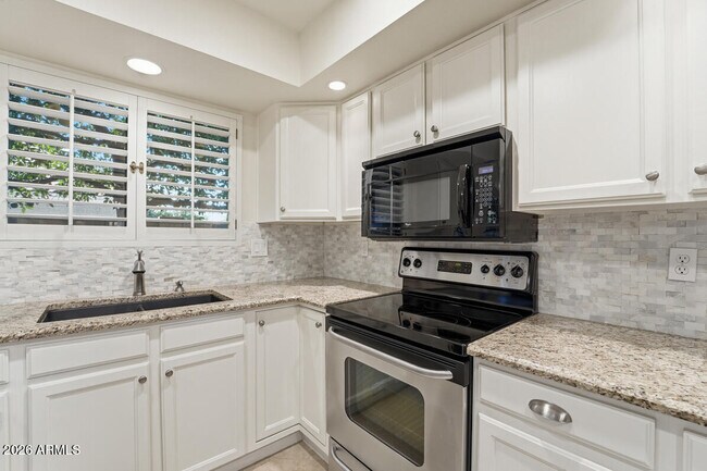 Building Photo - 5720 E Le Marche Ave