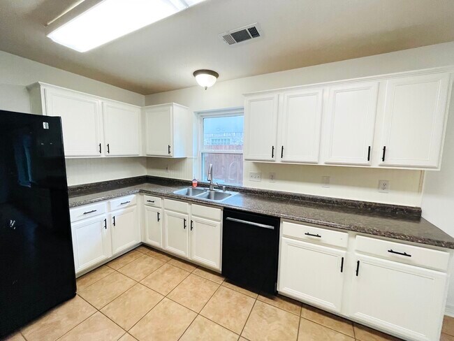 Lots of counter and cabinet space - 14511 Enola Dr