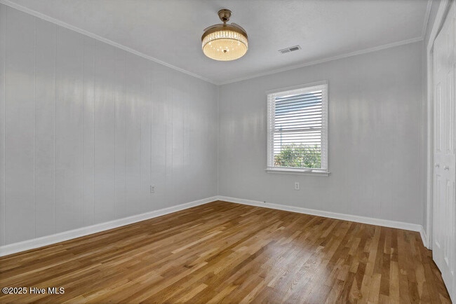 Building Photo - 1207 N Topsail Dr