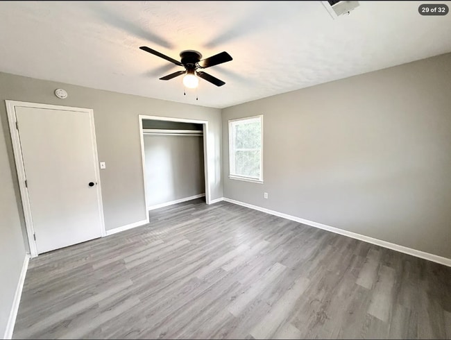 Building Photo - AVAILABLE NOW – FAIRBURN, GA 4 Bedrooms + Flexible Main-Level Living Space | Full Bathroom on Mai...