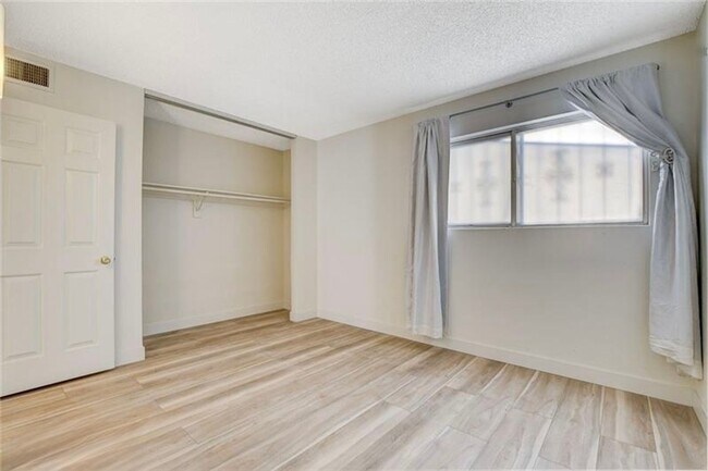 Building Photo - Completely Updated and Move-In Ready, 2 bedroom, 1 bath first floor unit!
