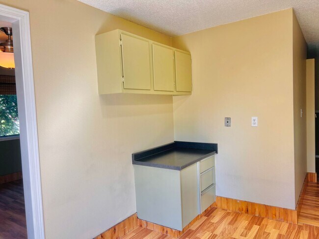 Building Photo - Charming 3BR/1BA w/ 1-car garage, long driveway, fenced yard, wood stove & shed/workshop.
