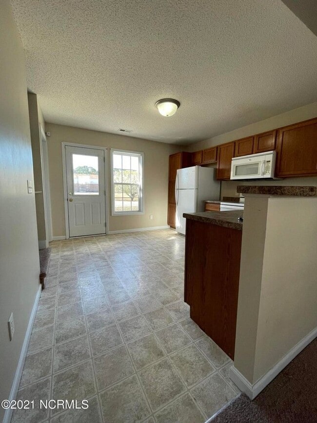 Building Photo - Welcome to Cornerstone Village!