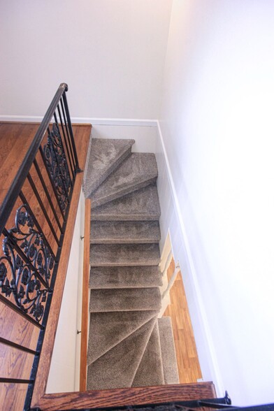 Stairs to bonus room and garage - 834 Raven Rd