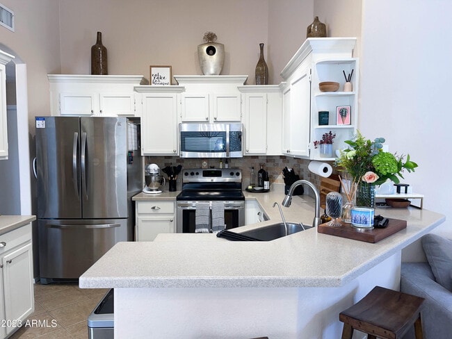 Building Photo - 1077 W Olive Ave